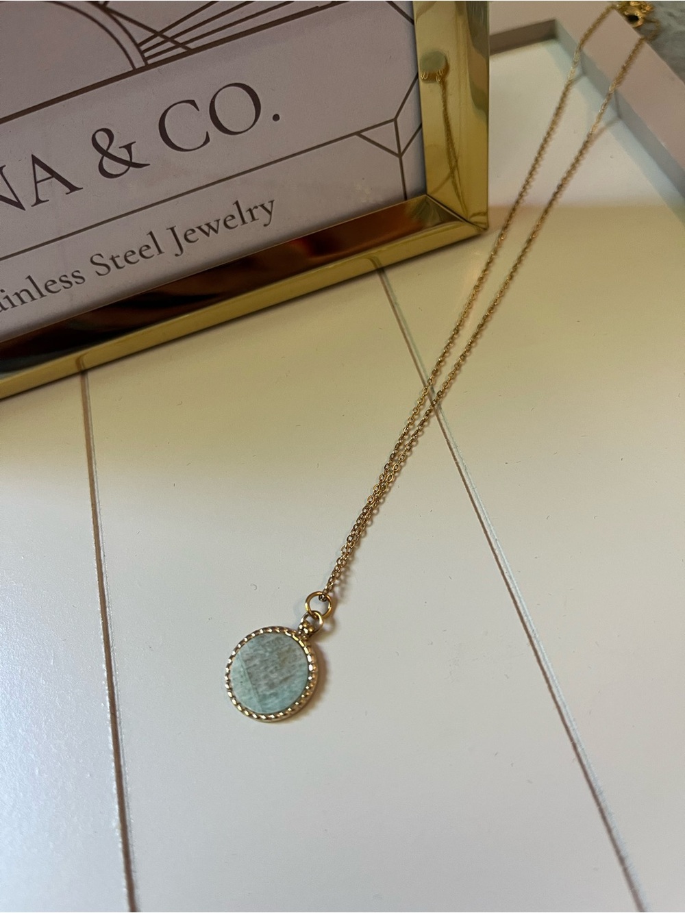 Gold Stainless Steel Necklace with a Light Blue Elegant Delicate Stone Pendant